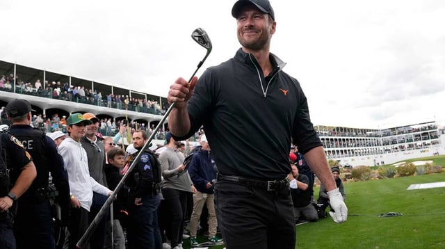 Actor Glen Powell reacts to his shot during the WHOOP Shot at Glory on the 16th hole at TPC Scottsdale on Feb. 7, 2024.