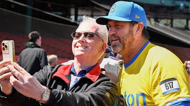 Apr 20, 2025; Boston, Massachusetts, USA; Boston Red Sox game planning and run prevention coach Jason Varitek (33) poses for a selfie on fan picture day before a game against the Chicago White Sox at Fenway Park. Mandatory Credit: Eric Canha-Imagn Images
