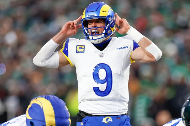 Matthew Stafford #9 of the Los Angeles Rams prepares for the snap during the first half of the NFC Divisional Playoff game against the Philadelphia Eagles at Lincoln Financial Field on January 19, 2025 in Philadelphia, Pennsylvania.
