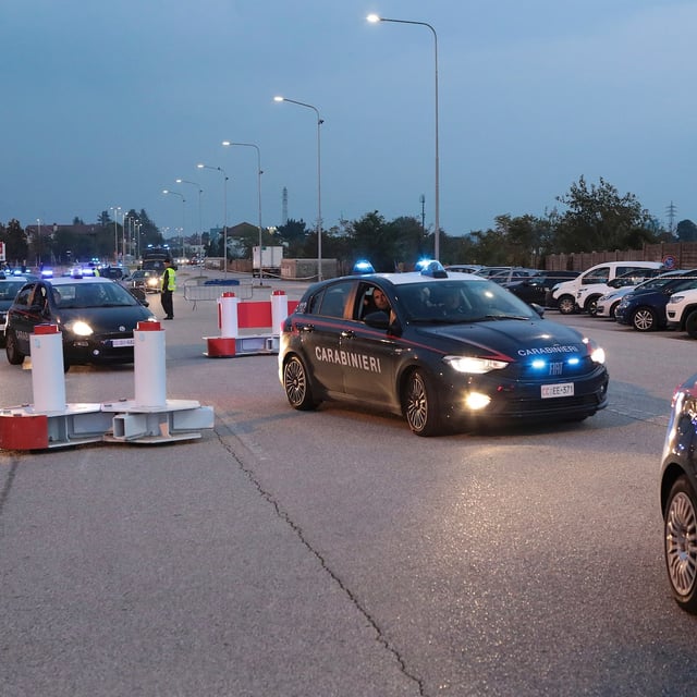 FILE - Carabinieri (Italian paramilitary police) patrol ahead of the Nations League soccer match between Italy and Israel, outside the Bluenergy stadium in Udine, Italy, Monday, Oct. 14, 2024. (Andrea Bressanutti/LaPresse via AP, file)