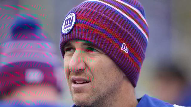 Dec 15, 2019; East Rutherford, NJ, USA; New York Giants quarterback Eli Manning (10) on the sideline during the first quarter against the Miami Dolphins at MetLife Stadium. Mandatory Credit: Brad Penner-Imagn Images.