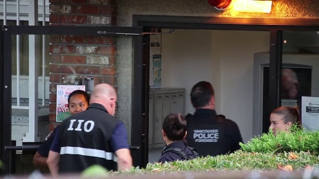 An IIO investigator arrives at the scene of a fatal police shooting in Vancouver on Tuesday, Aug. 19, 2025.