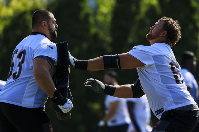 Jul 23, 2025; Cincinnati, OH, USA; Cincinnati Bengals guard Dylan Fairchild (63) warms up with guard Cordell Volson (67) during training camp at Kettering Health Practice Field. Mandatory Credit: Katie Stratman-Imagn Images/ File Photo