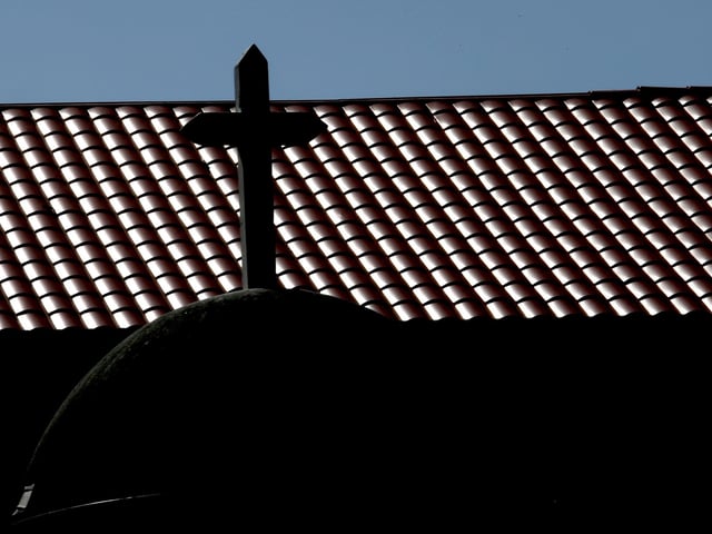 High noon sun creates a pattern of shadows on the clay roof top of Our Lady of Guadalupe Catholic church Thursday, July 13, 2023, in Mission, Texas. (Delcia Lopez/The Monitor via AP)