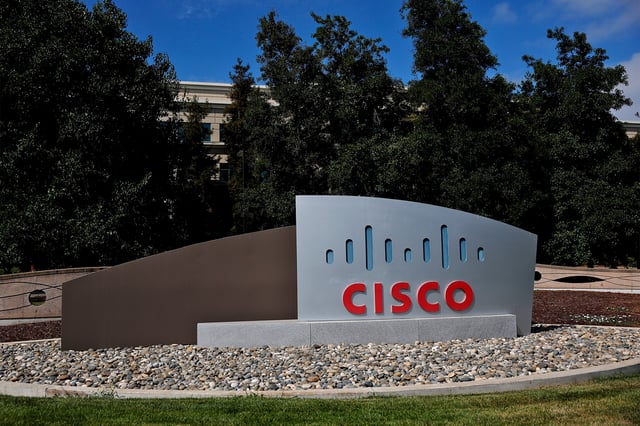 The Cisco sign in front of a building at Cisco headquarters on Aug. 13, 2025, in San Jose, Calif.