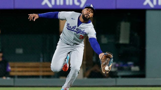 Aug 18, 2025; Denver, Colorado, USA; Los Angeles Dodgers right fielder Teoscar Hernandez (37) is unable to make a catch in the ninth inning against the Colorado Rockies at Coors Field. Mandatory Credit: Isaiah J. Downing-Imagn Images