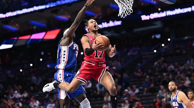 Apr 13, 2025; Philadelphia, Pennsylvania, USA; Chicago Bulls guard Jahmir Young (17) drives to shoot against Philadelphia 76ers center Adem Bona (30) in the fourth quarter at Wells Fargo Center. Mandatory Credit: Kyle Ross-Imagn Images