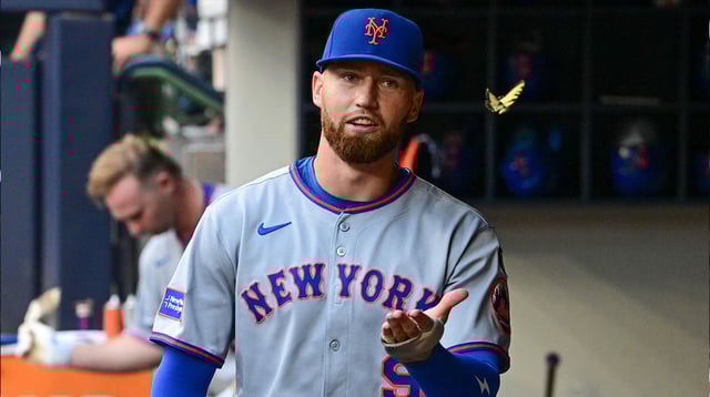 Aug 8, 2025; Milwaukee, Wisconsin, USA; New York Mets left fielder Brandon Nimmo (9) chases a butterfly in the dugout during game against the Milwaukee Brewers at American Family Field. Mandatory Credit: Benny Sieu-Imagn Images