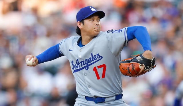 Dodgers starting pitcher Shohei Ohtani throws to the plate during the second inning of their game against the Colorado Rockies on Wednesday night at Coors Field in Denver. (Photo by Justin Edmonds/Getty Images)