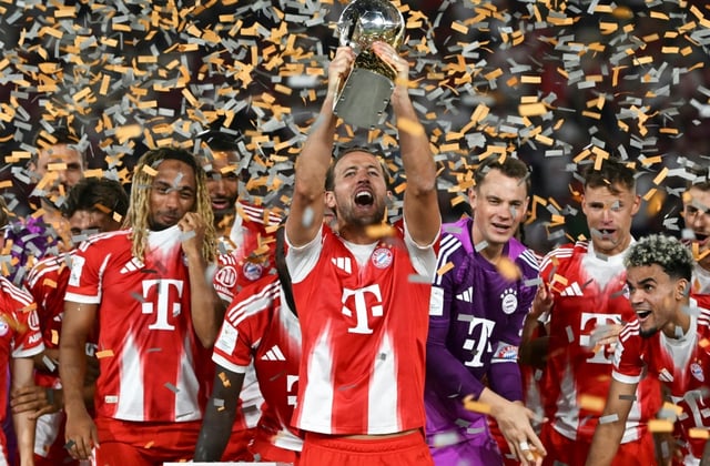 Bayern Munich striker Harry Kane lifts the Franz Beckenbauer Super Cup. The trophy was the second team honour in Kane's career, after the 2024-25 Bundesliga.