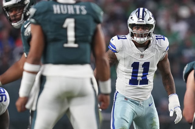 Micah Parsons #11 of the Dallas Cowboys looks on against Jalen Hurts #1 of the Philadelphia Eagles at Lincoln Financial Field on November 5, 2023 in Philadelphia, Pennsylvania.