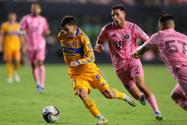 Aug 20, 2025; Fort Lauderdale, Florida, USA; Tigres UANL forward Angel Correa (7) dribbles the ball past Inter Miami CF defender Gonzalo Lujan (2) and defender Marcelo Weigandt (57) before scoring during the second half at Chase Stadium. Mandatory Credit: Sam Navarro-Imagn Images