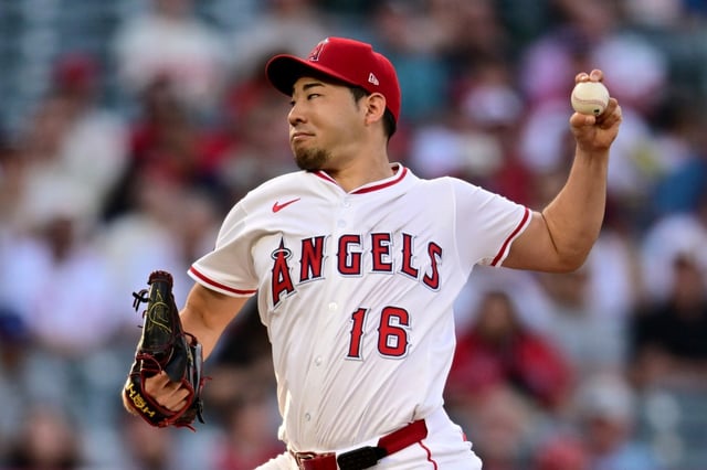 Angels starting pitcher Yusei Kikuchi throws to the plate during the first inning of their game against the Cincinnati Reds on Wednesday night at Angel Stadium. (Photo by John McCoy/Getty Images)