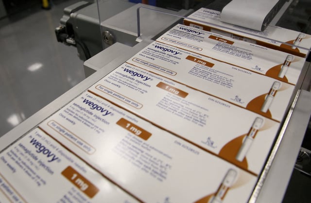Boxes of Wegovy move along a packaging line at Novo Nordisk's facility in Hillerod, Denmark, March 8, 2024. REUTERS/ Tom Little/File Photo