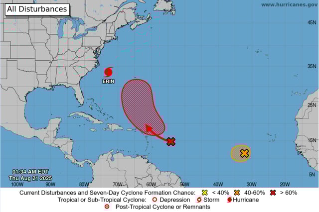 An NHC graphic highlights features being monitored in the Atlantic Ocean, with the disturbance in question displayed in red.