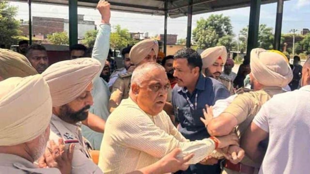 BJP leader KD Bhandari being detained at Shahkot in Jalandhar district on Thursday for organising the party’s outreach programme. (HT Photo)