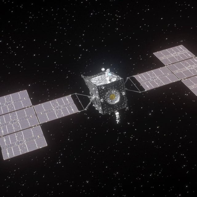 NASA's Psyche orbiter looked back and snapped a photo of Earth with the moon on its way to the asteroid Psyche in 2029.
