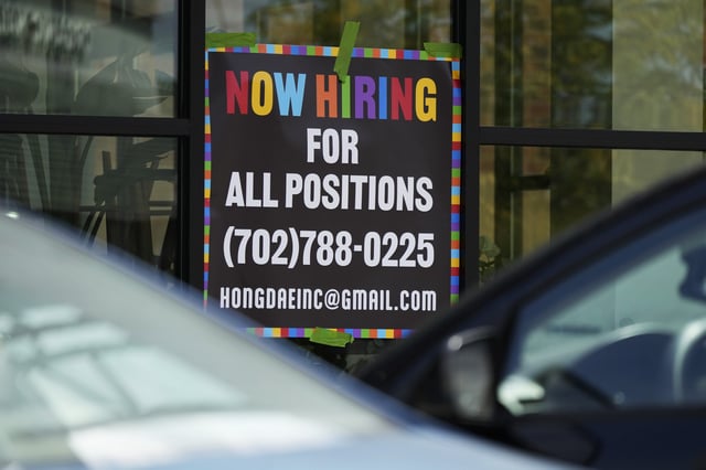 FILE - A hiring sign is displayed at a restaurant in Mount Prospect, Ill., Aug. 27, 2024. (AP Photo/Nam Y. Huh, file)
