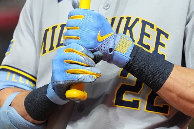 CINCINNATI, OHIO - AUGUST 15: Detailed look at the Nike Batting Gloves worn by Christian Yelich #22 of the Milwaukee Brewers during the game against the Cincinnati Reds at Great American Ball Park on August 15, 2025 in Cincinnati, Ohio.