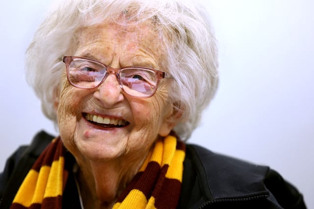 Sister Jean has a hearty laugh in her office on the campus of Loyola University in Chicago's Rogers Park neighborhood on Feb. 8, 2023. (Chris Sweda/Chicago Tribune)