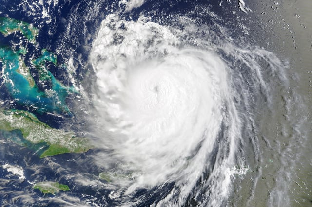 A satellite image shared by NASA Earth Observatory shows hurricane Erin as it roils over the Atlantic.