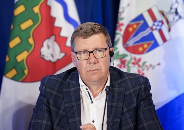 Saskatchewan Premier Scott Moe listens to a question from the media during the 2025 summer meetings of Canada’s Premiers at Deerhurst Resort in Huntsville, Ont., on Wednesday, July 23, 2025. THE CANADIAN PRESS/Nathan Denette