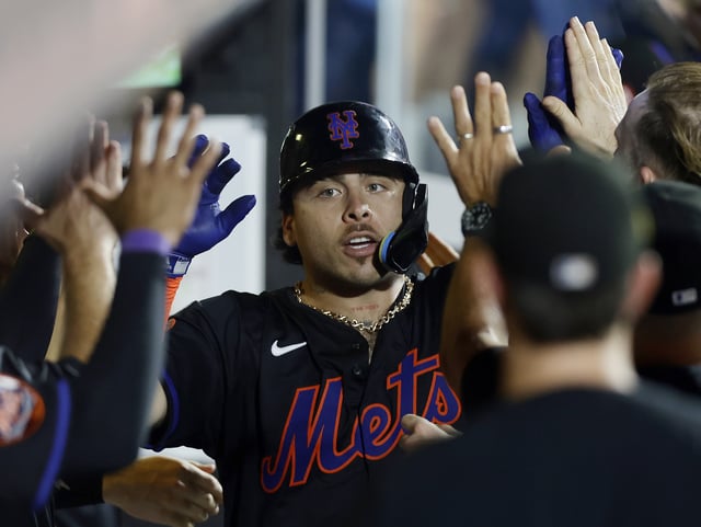 NEW YORK, NEW YORK - AUGUST 15: Francisco Alvarez #4 of the New York Mets celebrates his three run home run against the Seattle Mariners at Citi Field on August 15, 2025 in New York City. The Mariners defeated the Mets 11-9. (Photo by Jim McIsaac/Getty Images)