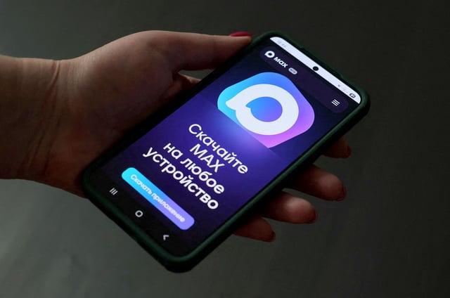 A web page of the Russian MAX messaging app is displayed on a smartphone screen in this illustration taken July 21, 2025. REUTERS/Shamil Zhumatov/Illustration
