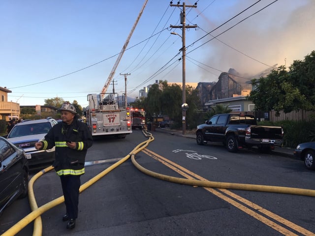A fire burns in San Rafael's Canal neighborhood early on Thursday, Aug. 21, 2025 (Alan Dep - Marin Independent Journal)