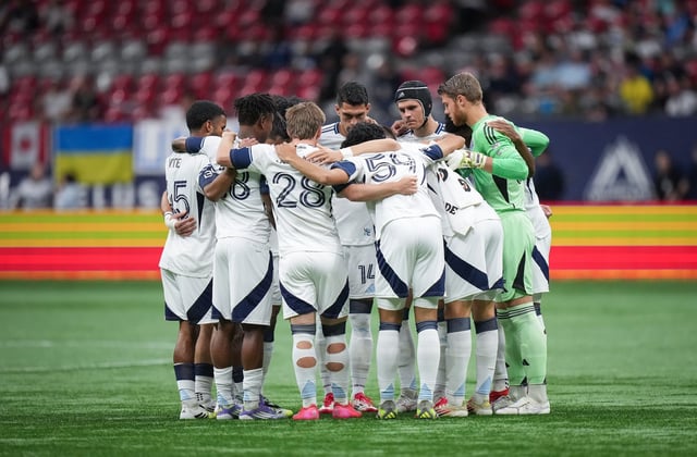 Vancouver Whitecaps players gather on the field before playing Valour FC during a Canadian Championship quarterfinal soccer match, in Vancouver, B.C., Wednesday, July 9, 2025. THE CANADIAN PRESS/Darryl Dyck