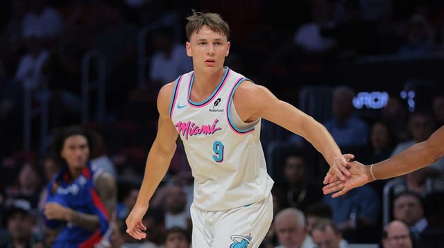 Apr 7, 2025; Miami, Florida, USA; Miami Heat guard Pelle Larsson (9) celebrates after scoring against the Philadelphia 76ers during the first quarter at Kaseya Center. Mandatory Credit: Sam Navarro-Imagn Images