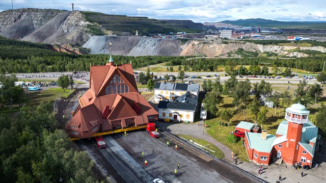An aerial view shows the wooden Kiruna Church being transferred to its new location, in Kiruna, Sweden, on August 19, 2025.