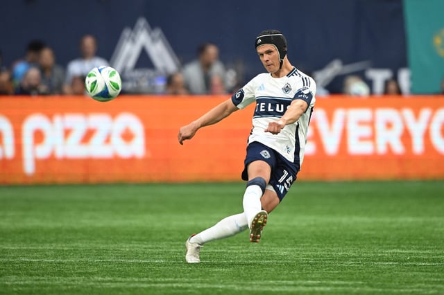 Jul 26, 2025; Vancouver, British Columbia, CAN;  Vancouver Whitecaps FC defender Bjorn Inge Utvik (15) passes the ball during the first half against the Sporting Kansas City at BC Place. Mandatory Credit: Anne-Marie Sorvin-Imagn Images/File Photo