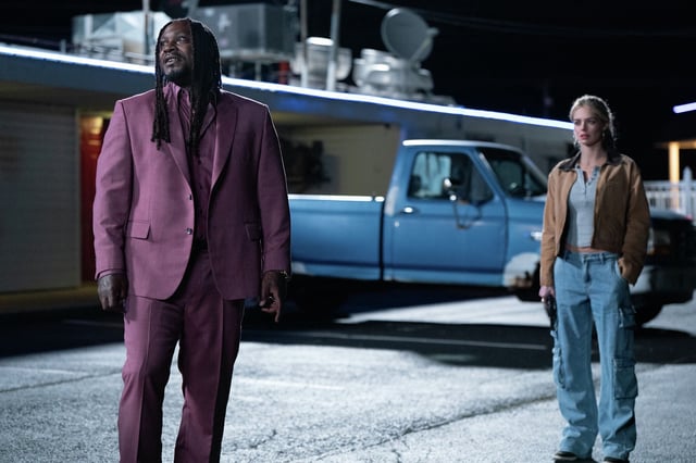 Former Oakland Raiders star Marshawn Lynch, left, brings charisma to his role as a getaway driver alongside Samara Weaving in “Eenie Meanie.” 