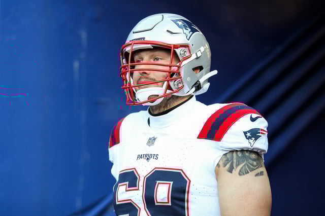 ORCHARD PARK, NEW YORK - DECEMBER 22: Cole Strange #69 of the New England Patriots looks on prior to a game against the Buffalo Bills at Highmark Stadium on December 22, 2024 in Orchard Park, New York. (Photo by Bryan Bennett/Getty Images)