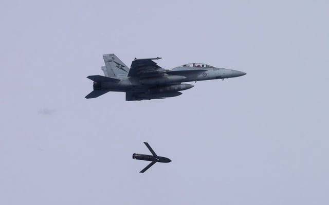 Pictured is a Royal Australian Air Force F/A-18F launching an AGM-158C Long-Range Anti-Ship Missile during a test in February (Australian Defence Force Photo)