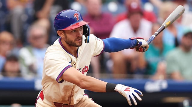 Aug 20, 2025; Philadelphia, Pennsylvania, USA; Philadelphia Phillies shortstop Trea Turner (7) hits an RBI single during the seventh inning against the Seattle Mariners at Citizens Bank Park. Mandatory Credit: Bill Streicher-Imagn Images