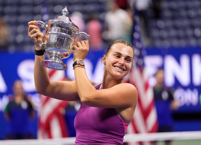 Aryna Sabalenka celebrates with the US Open trophy after defeating Jessica Pegula in last year's women's final.