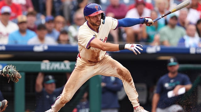 Aug 20, 2025; Philadelphia, Pennsylvania, USA; Philadelphia Phillies shortstop Trea Turner (7) hits an RBI single during the seventh inning against the Seattle Mariners at Citizens Bank Park. Mandatory Credit: Bill Streicher-Imagn Images