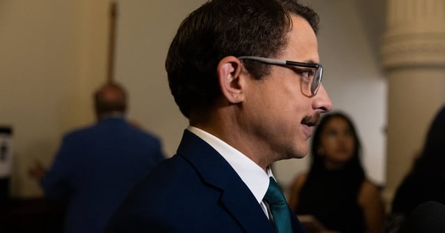 State Rep. Briscoe Cain, R-Deer Park, speaks with press outside the Texas House on Aug. 18, 2025.