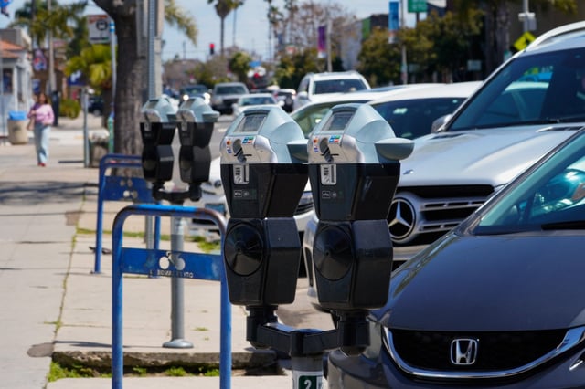 San Diego is extending the hours of parking meters and ending free Sunday parking in many neighborhoods, including Pacific Beach. Here, parking meters are shown along Garnet Avenue on Friday, April 4, 2025. (Nelvin C. Cepeda / The San Diego Union-Tribune)