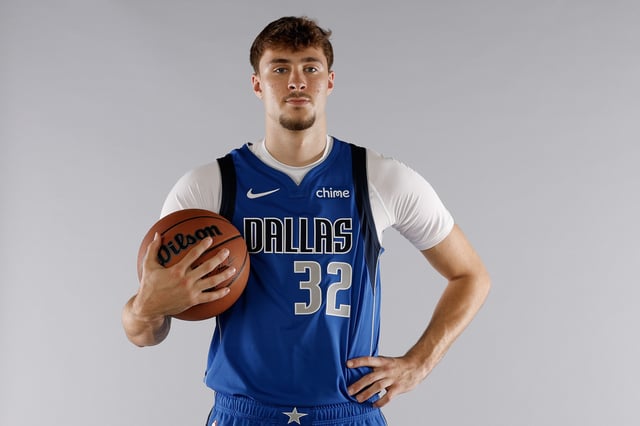 Cooper Flagg #32 of the Dallas Mavericks poses for a portrait during the 2025 NBA Rookie Photo Shoot at UNLV on July 15, 2025 in Las Vegas, Nevada.