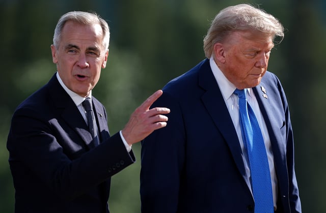Prime Minister Mark Carney, left, and U.S. President Donald Trump leave after posing for the family photograph during the G7 Summit in Kananaskis, Alta., on June 16, 2025. THE CANADIAN PRESS/Darryl Dyck