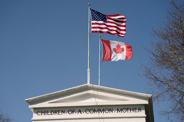 Flags fly above the Peace Arch, at a Canada-U.S. border crossing known as the Peace Arch Border Crossing in Blaine, Washington, U.S. April 2, 2025.  REUTERS/David Ryder/File Photo
