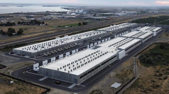 FILE - Amazon Web Services data center is visible on Aug. 22, 2024, in Boardman, Ore. (AP Photo/Jenny Kane, File)