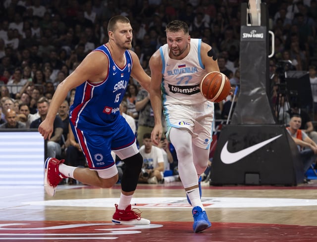 Luka Doncic (R) of Slovenia in action against Nikola Jokic (L) of Serbia during the International Basketball Friendly match between Serbia and Slovenia at Belgrade Arena on August 21, 2025 in Belgrade, Serbia.