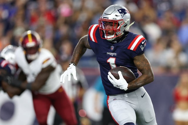 Aug 8, 2025; Foxborough, Massachusetts, USA; New England Patriots receiver Ja'Lynn Polk (1) runs the ball during the first half against the Washington Commanders at Gillette Stadium. Mandatory Credit: Paul Rutherford-Imagn Images/ File Photo