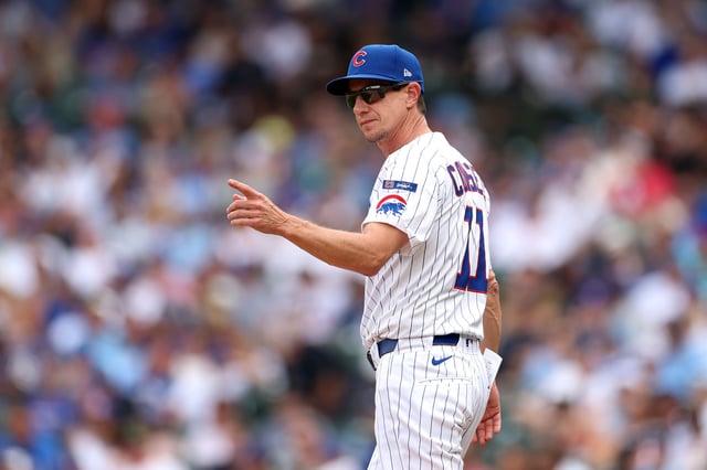CHICAGO, ILLINOIS - AUGUST 17: Manager Craig Counsell of the Chicago Cubs calls for a pitching change against the Pittsburgh Pirates during the eighth inning at Wrigley Field on August 17, 2025 in Chicago, Illinois.