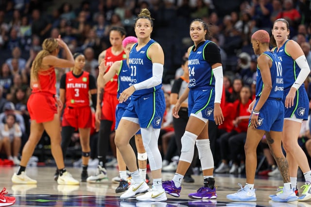 Kayla McBride #21 of the Minnesota Lynx looks on during a game against the Atlanta Dream at Target Center on July 27, 2025 in Minneapolis, Minnesota.