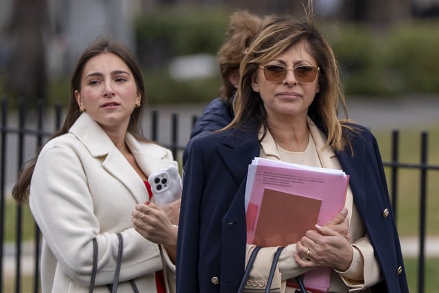 FILE - FOX Business Network anchor Maria Bartiromo, right, arrives at the White House, March 6, 2025, in Washington. (AP Photo/Alex Brandon, File)
